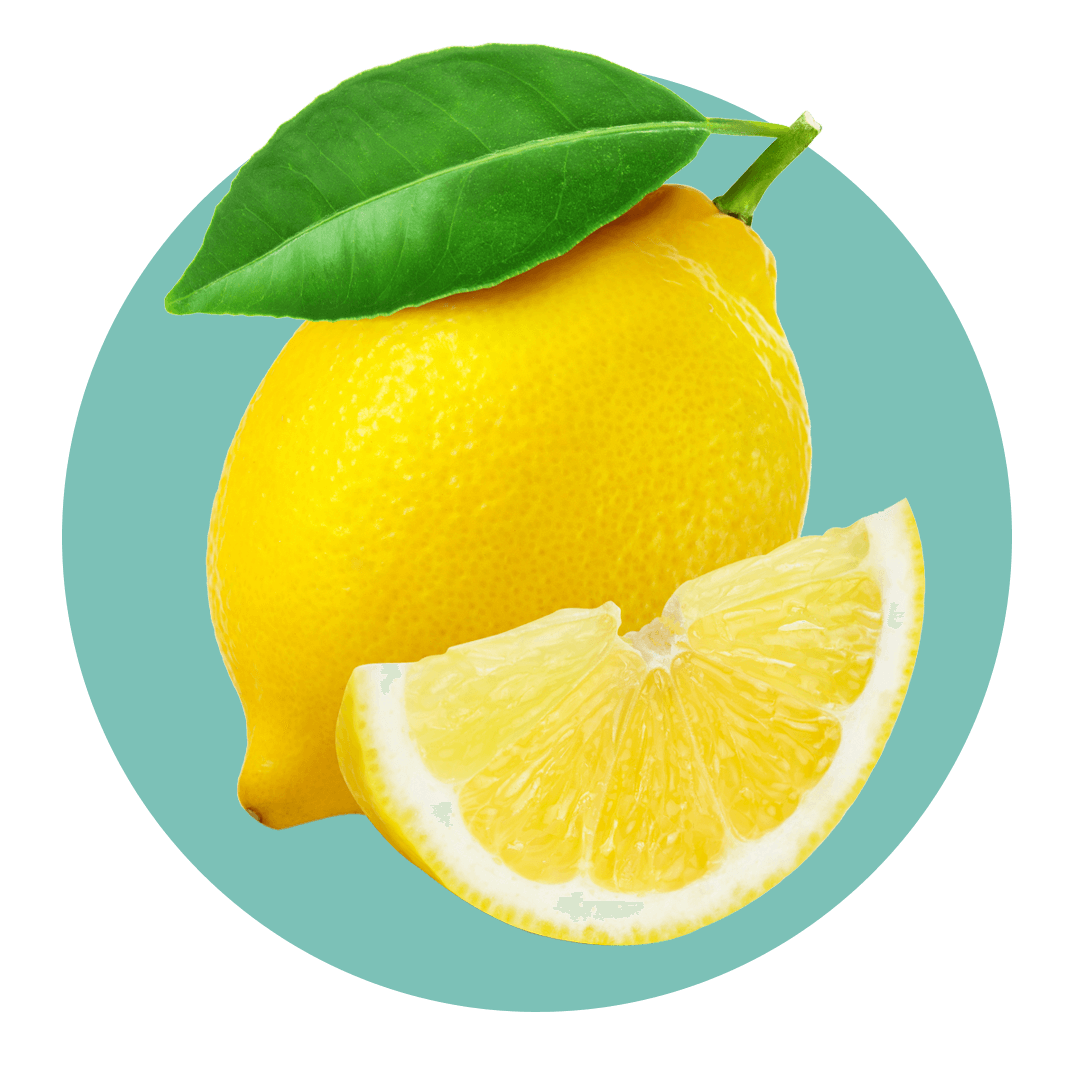 Lemon slice next to lemon with green leaf