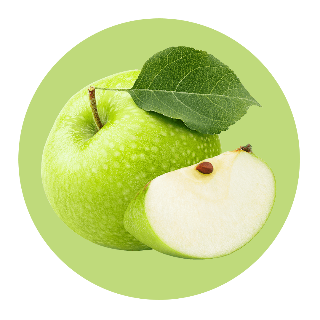 Sliced apple next to whole green apple
