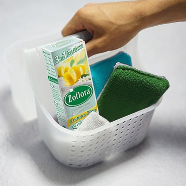 Zoflora in cleaning tray next to sponge