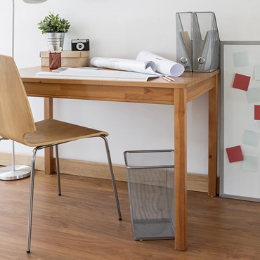 Office waster paper bin under desk