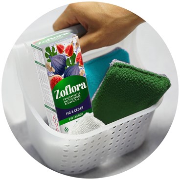 Zoflora in cleaning tray next to sponge